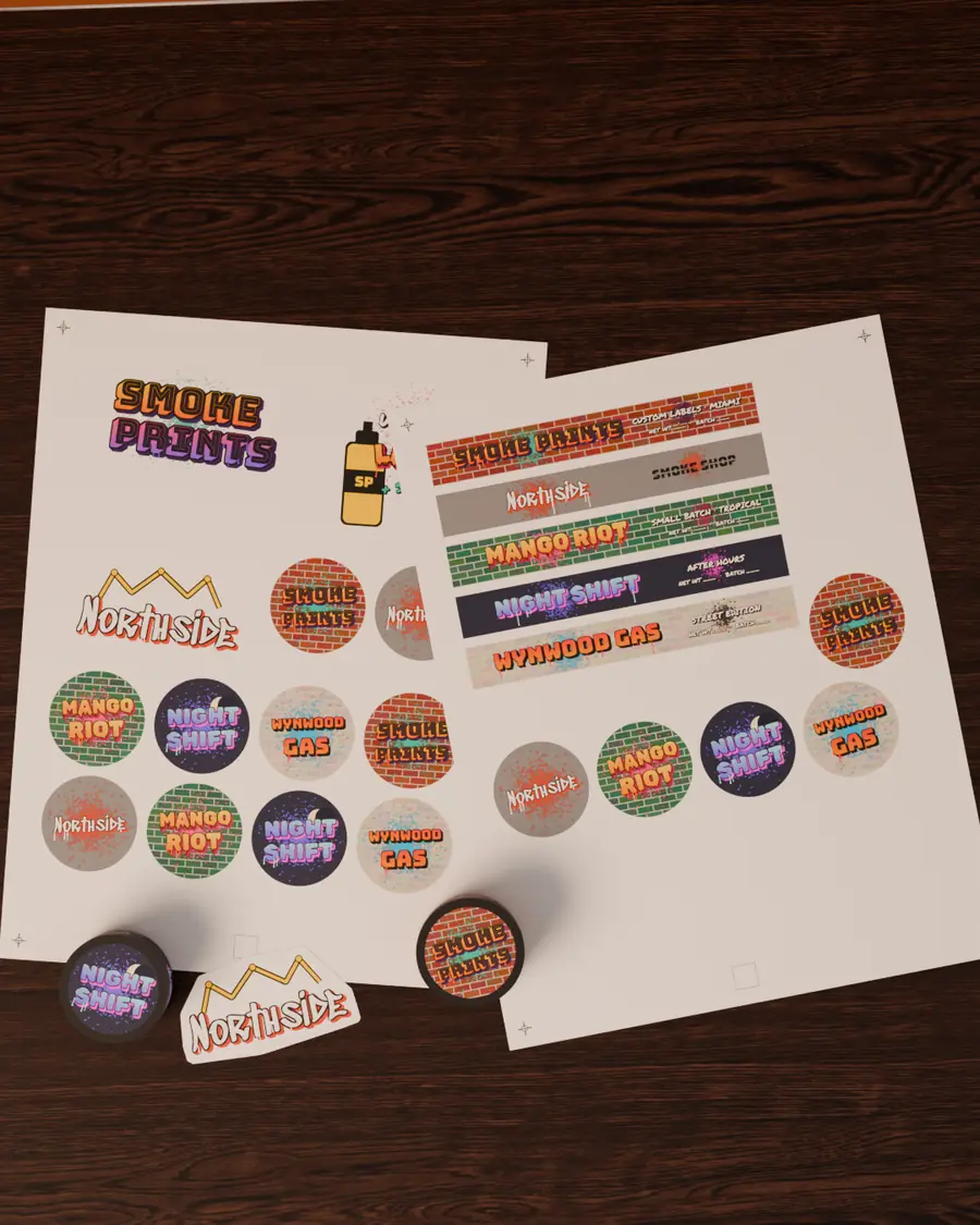 Sheets of custom kiss-cut stickers with shop logos